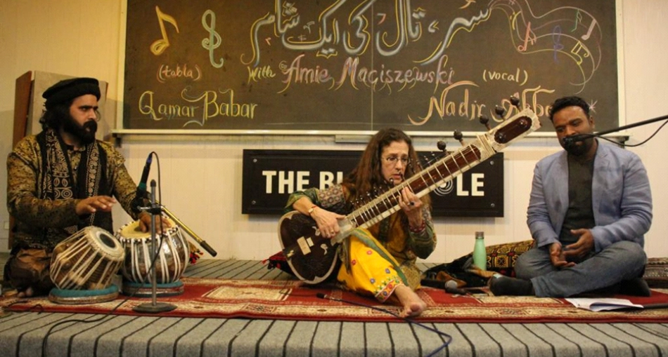 Qamar Babar (tabla), Amie (sitar), and Nadir Abbas (vocal) perform at The Black Hole, Islamabad, March 2023